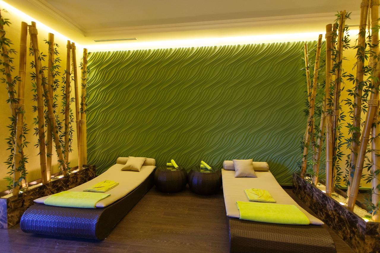 Sultan Palace Hotel Atyraū Extérieur photo A relaxation room at a spa